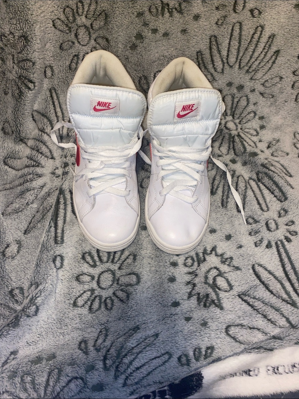 Nike White High-Top Sneakers with Pink Swoosh